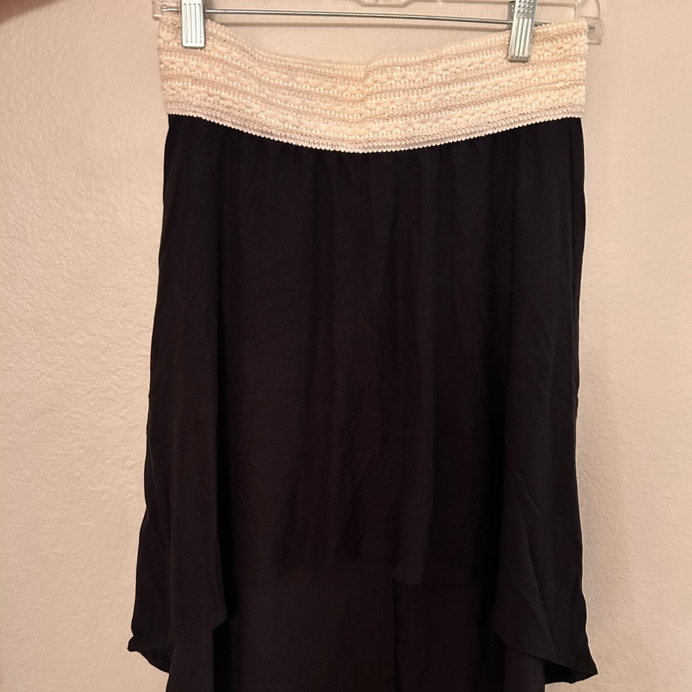 Never worn! Lace waist, asymmetrical front is shorter than back